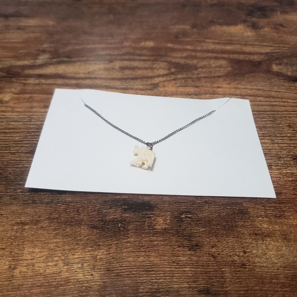 silver tone necklace with cream elephant pendant - Picture 2 of 5